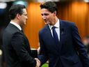 Prime Minister Justin Trudeau and Conservative Leader Pierre Poilievre greet each other as they meet in the House of Commons on Parliament Hill in Ottawa. 