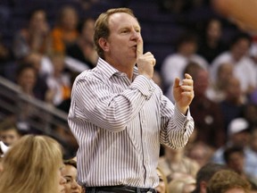 FILE - Phoenix Suns owner Robert Sarver gestures to Indiana Pacers' Danny Granger after Granger missed a shot during the second half of an NBA basketball game Saturday, March 6, 2010 in Phoenix. Robert Sarver says he has started the process of selling the Phoenix Suns and Phoenix Mercury, a move that comes only eight days after he was suspended by the NBA over workplace misconduct including racist speech and hostile behavior toward employees. Sarver made the announcement Wednesday, Sept. 21, 2022, saying selling "is the best course of action." He has owned the teams since 2004.