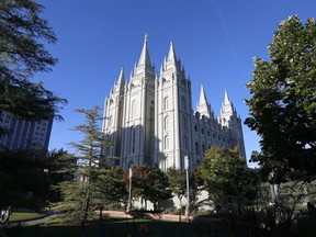 FILE - The Salt Lake Temple stands at Temple Square in Salt Lake City on Oct. 5, 2019. Merrill Nelson, a Utah lawmaker and prominent attorney for the Church of Jesus Christ of Latter-day Saints advised a church bishop not to report a confession of child sex abuse to authorities, a decision that allowed the abuse to continue for years, according to records filed in a 2021 lawsuit by three of Paul Adams' children.
