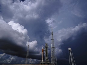 FILE - The NASA moon rocket stands on Pad 39B before a launch attempt for the Artemis 1 mission to orbit the moon at the Kennedy Space Center, Friday, Sept. 2, 2022, in Cape Canaveral, Fla. On Friday, Sept. 23, 2022, a storm in the Caribbean is threatening to delay NASA's third attempt to launch the rocket.