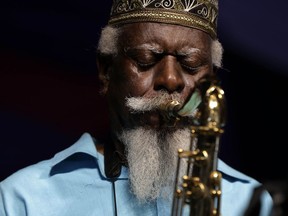 FILE - Jazz saxophonist Pharoah Sanders performs at the New Orleans Jazz and Heritage Festival in New Orleans, Friday, May 2, 2014. The influential tenor saxophonist revered in the jazz world for the spirituality of his work, has died, his record label announced on Saturday, Sept. 24, 2022. He was 81.
