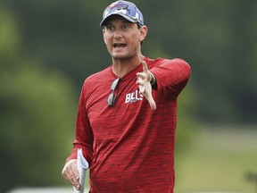 FILE - Buffalo Bills offensive coordinator Ken Dorsey speaks to the wide receivers during practice at the NFL football team's training camp in Pittsford, N.Y., Aug. 4, 2022. Dorsey can appreciate a need to rein back his emotions after a video clip showed him in the visitors' coaches booth ripping off his headset and violently bouncing it off the table, before trashing his game notes in the immediate aftermath of a 21-19 loss to the Miami Dolphins on Sunday, Sept. 25, 2022.
