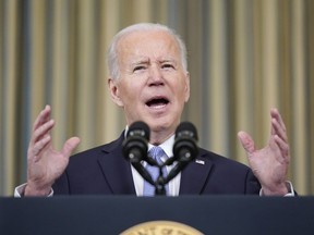 FILE - President Joe Biden speaks in the State Dining Room of the White House on April 1, 2022, in Washington. Biden has the same authority to impose a COVID-19 vaccine requirement on federal workers that private employers have for their employees, an administration lawyer told a federal appeals court Tuesday, Sept. 13, 2022.