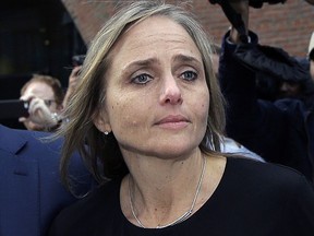 FILE - District court judge Shelley M. Richmond Joseph departs federal court on April 25, 2019, in Boston. Federal prosecutors have agreed to dismiss charges against Joseph, who was accused of helping a man who was living in the U.S. illegally evade an immigration enforcement agent, officials said Thursday, Sept. 22, 2022.