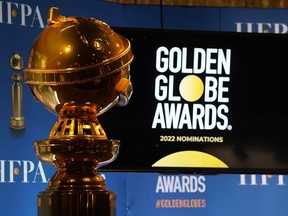 FILE - A Golden Globe statue appears at the nominations event for 79th annual Golden Globe Awards at the Beverly Hilton Hotel on Dec. 13, 2021, in Beverly Hills, Calif. After a year spent off air, the Golden Globe Awards are returning to NBC in January, NBC, the Hollywood Press Association and Dick Clark Productions announced Tuesday , Sept. 20, 2022.