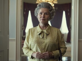 This image released by Netflix shows Imelda Staunton as Queen Elizabeth in "The Crown." Netflix's acclaimed series about Queen Elizabeth II and her family, has paused production due to the monarch's death.