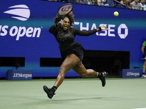 FILE - Serena Williams, of the United States, returns a shot to Ajla Tomljanovic, of Australia, during the third round of the U.S. Open tennis championships, Friday, Sept. 2, 2022, in New York. It could have been just one night, but Williams' exit from tennis turned into a boon for ESPN. Williams' third-round defeat at the hands of Ajla Tomljanovic had the largest audience of any tennis match in ESPN's 43-year history, beating the 3.9 million who watched the 2012 Wimbledon men's final between Roger Federer and Andy Murray.