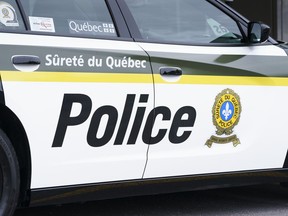 A Surete du Quebec police car is seen in Montreal on July 22, 2020. Quebec provincial police are investigating an allegedly armed and dangerous suspect in St-Elzéar-de-Bonaventure, in the Gaspé region.