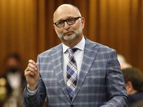 Justice Minister David Lametti rises during Question Period in the House of Commons on Parliament Hill in Ottawa on Monday, June 20, 2022. Lametti urged Senators Wednesday night to pass the Liberal government's proposed legislation on mandatory minimum penalties.THE CANADIAN PRESS/ Patrick Doyle