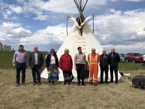 Indigenous and non-Indigenous officials gather for the Killsquaw Lake renaming ceremony in 2019. The lake is now known as Kikiskitotawânawak Iskêwak.