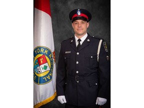 York Regional Police Const. Travis Gillespie is shown in an undated handout photo provided by York Regional Police. A funeral service for Gillespie, who was killed in an early morning collision last week, is being held Thursday in Markham, Ont.