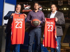 Vancouver Bandits basketball team owners Bryan Slusarchuk (left) and Kevin Dhaliwal (right) and team president Dylan Kular (centre) are shown in a handout photo.