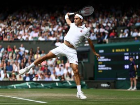 Roger Federer competes during Wimbledon in 2021. Photographer: Julian Finney/Getty Images