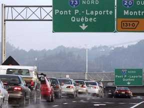 Motorists are stuck in a traffic jam trying to cross the Pierre Laporte bridge on Sept. 29, 2004, in Quebec City. Coalition Avenir Québec Leader François Legault may have been campaigning in a Montreal suburb Monday, but many of the questions he faced from reporters were about a proposed tunnel in Quebec City.
