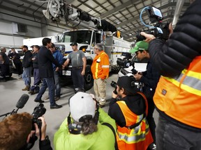 Prime Minister Justin Trudeau meets with Hydro Ottawa workers on Monday, Sept. 26, 2022.&nbsp;Hydro One says it's sending some 30 workers to help restore power in Nova Scotia in the wake of post-tropical storm Fiona.&nbsp;THE CANADIAN PRESS/Sean Kilpatrick