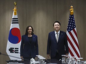 U.S. Vice President Kamala Harris, left, and South Korea's President Yoon Suk Yeol pose for a photo at a bilateral meeting in Seoul Thursday, Sept. 29, 2022.