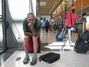 Bill Wagner, of Allentown, Pa., waits in the concourse at Austin-Bergstrom International Airport after a power outage at the airport caused his flight home to be cancelled on Wednesday, Sept. 7, 2022, in Austin, Texas. An early morning power outage Wednesday at the airport caused flight delays that continued even after electricity was restored.