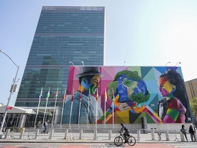A mural by Brazilian artist Eduardo Kobra, focusing attention on climate change and stewardship of the planet is displayed outside the United Nations headquarters ahead of the General Assembly, Friday, Sept. 16, 2022.