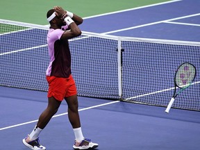 Frances Tiafoe, of the United States, celebrates after defeating Rafael Nadal, of Spain, during the fourth round of the U.S. Open tennis championships, Monday, Sept. 5, 2022, in New York.