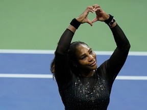 Serena Williams, of the United States, motions a heart to fans after losing to Ajla Tomljanovic, of Austrailia, during the third round of the U.S. Open tennis championships, Friday, Sept. 2, 2022, in New York.