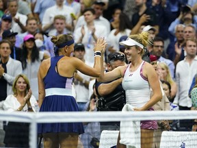 Lucie Hradecká, left, and Linda Nosková, of the Czech Republic, celebrate after winning their first-round doubles match against Serena Williams and Venus Williams, of the United States, at the U.S. Open tennis championships, Thursday, Sept. 1, 2022, in New York.