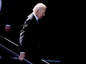 President Joe Biden walks down some stairs during an event at Henry Maier Festival Park in Milwaukee, Monday, Sept. 5, 2022. Biden is in Wisconsin this Labor Day to kick off a nine-week sprint to the crucial midterm elections.