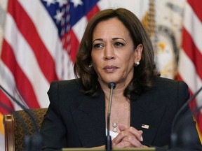 FILE - Vice President Kamala Harris listens during a meeting with civil rights and reproductive rights leaders in the Diplomatic Reception Room on the White House complex in Washington, Sept. 12, 2022. Two buses of migrants from the U.S.-Mexico border were dropped off near Harris' home in residential Washington on Thursday, Sept. 15.