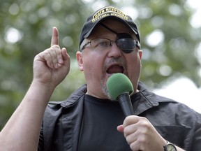 FILE - Stewart Rhodes, founder of the Oath Keepers, speaks during a rally outside the White House in Washington, June 25, 2017. The trial of the founder of the Oath Keepers and four associates charged with seditious conspiracy in the attack on the U.S. Capitol is set to begin next week.