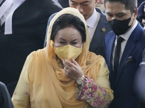 Rosmah Mansor, wife of former Malaysian Prime Minister Najib Razak, arrives at Kuala Lumpur High Court in Kuala Lumpur, Thursday, Sept. 1, 2022. The wife of jailed ex-Prime Minister Najib Razak arrived in court Thursday, for a verdict in her corruption trial involving a 1.25 billion ringgit ($279 million) solar energy project, just days after her husband was imprisoned over the looted 1MDB state fund.