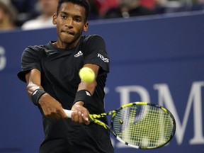 Felix Auger-Aliassime, of Canada, competes against Jack Draper, of Britain, during the second round of the U.S. Open tennis championships, Wednesday, Aug. 31, 2022, in New York.&ampnbsp;Auger-Aliassime defeated J.J. Wolf 6-4, 6-4 to win his second ATP Tour trophy at the Firenze Open on Sunday.