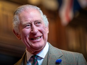 King Charles III visits Aberdeen Town House to meet families who have settled in Aberdeen from Afghanistan, Syria and Ukraine on October 17, 2022 in Aberdeen, Scotland.