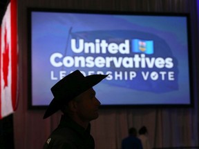 Supporters wait for ballot results at the BMO Centre in Calgary for  the UCP leadership vote on Thursday, October 6, 2022. Jim Wells/Postmedia