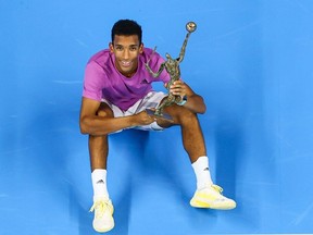 Canada's Felix Auger-Aliassime poses with his trophy after winning the men's single final match at the ATP European Open Tennis tournament in Antwerp on October 23, 2022.