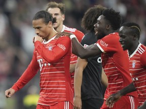 Bayern's Leroy Sane, left, and teammate&ampnbsp;Alphonso Davies celebrate after scoring his side's third goal during the German Bundesliga soccer match between FC Bayern Munich and SC Freiburg at the Allianz Arena in Munich, Germany, Oct. 16, 2022.