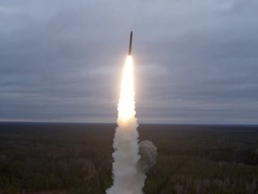 A still image from video, released by the Russian Defence Ministry, shows what it said to be Russia's Yars intercontinental ballistic missile launched during exercises held by the country's strategic nuclear forces at the Plesetsk Cosmodrome, Russia, in this image taken from handout footage released October 26, 2022.