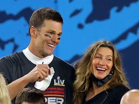 Tom Brady of the Tampa Bay Buccaneers and his wife Gisele Bundchen celebrate his team winning Super Bowl LV win in Tampa, Florida, February 07, 2021. The couple announced their divorce after 13 years of marriage on October 28, 2022.
