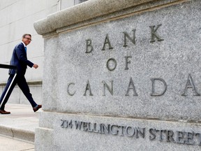 Governor of the Bank of Canada Tiff Macklem walks outside the Bank of Canada building in Ottawa, in 2020.