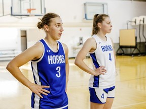 Ukrainian nationals Vlada Hozalova (3) and Vika Kovalevska (4) on the court during basketball practice at the University of Lethbridge, in Lethbridge, Alberta, Monday, Oct. 3, 2022.