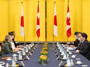 Canada's Foreign Minister Melanie Joly and Japan's Foreign Minister Yoshimasa Hayashi attend a meeting in Tokyo on October 11, 2022.