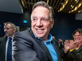 Premier François Legault meets with his new Coalition Avenir Québec (CAQ) caucus in Brossard, south of Montreal, on Oct. 6, 2022, following their overwhelming victory in the Oct. 3 provincial election. The premier and his party will be facing tough times ahead, warns André Pratte.