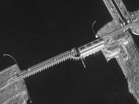 This Maxar satellite image taken and released on February 26, 2022, shows an overview of the Kakhovka hydroelectric plant on the Dnieper River in southern Ukraine.