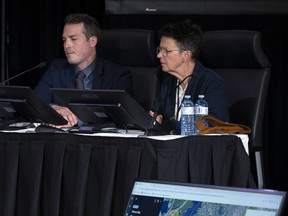 Ottawa City Councillors Mathieu Fleury, left, and Catherine McKenney are questioned during hearings at the Public Order Emergency Commission in Ottawa, October 14, 2022.