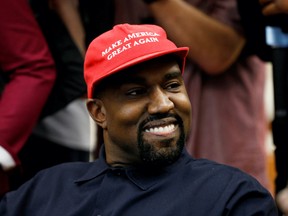 Kanye West smiles during a meeting with U.S. President Donald Trump to discuss criminal justice reform at the White House in Washington, U.S., October 11, 2018. REUTERS/Kevin Lamarque/File Photo