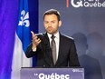 Parti Quebecois Leader Paul St-Pierre Plamondon speaks to supporters following his loss in the provincial election to a majority CAQ government in Boucherville, Que., October 3, 2022.