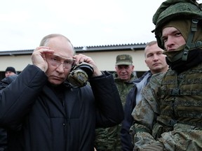 Russian President Vladimir Putin visits a training centre for mobilized reservists in Ryazan Region, Russia, on Oct. 20, 2022.
