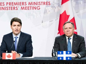 Prime Minister Justin Trudeau and Quebec Premier François Legault during a first ministers' meeting in 2018. Trudeau has promised the premiers since early in the pandemic that he would meet with them to discuss the future of health-care funding in Canada, but no meeting has been set.