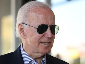 U.S. President Joe Biden speaks to media after casting his vote during early voting for the 2022 U.S. midterm elections at a polling station in Wilmington, Delaware, U.S. October 29, 2022. REUTERS/Tasos Katopodis