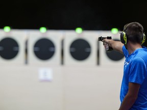 Peeter Olesk, of Estonia, competes in the men's 25-meter rapid fire pistol at the Asaka Shooting Range in the 2020 Summer Olympics, Monday, Aug. 2, 2021, in Tokyo, Japan. MPs are coming under pressure to broaden an exemption to a planned federal handgun freeze to include a wider range of sport shooters - an idea prominent firearm-control advocates firmly oppose.THE CANADIAN PRESS/AP Alex Brandon
