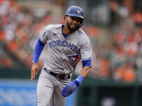 Toronto Blue Jays' Lourdes Gurriel Jr. runs the bases before scoring on a hit by George Springer during the ninth inning of the first game of a baseball doubleheader against the Baltimore Orioles, Monday, Sept. 5, 2022, in Baltimore. Toronto Blue Jays outfielder Lourdes Gurriel Jr. has had successful surgery on his left wrist.THE CANADIAN PRESS/AP, Julio Cortez