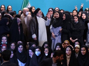 Iran's President Ebrahim Raisi speaking to female students during a ceremony marking the beginning of the academic year, in the capital Tehran's Al-Zahra university.